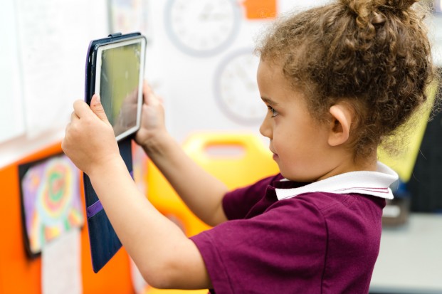 Child with iPad
